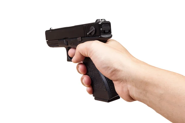 Pistole in der Hand und gerichtet, isoliert auf weißem Hintergrund — Stockfoto