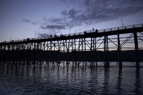 Utamanusorn Bridge (Mon Bridge), made from wooden for across the — Stock Photo, Image