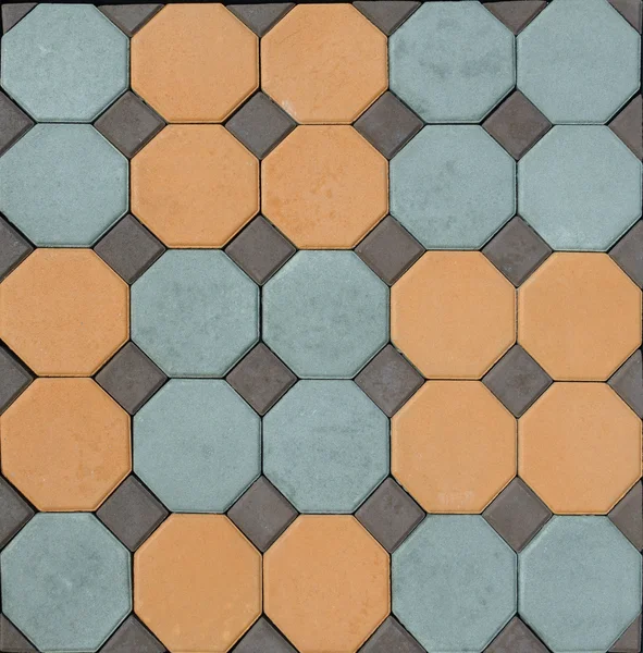 Плитка тротуарна плитка та мозаїчні бруківки з дрібних каменів text — стокове фото