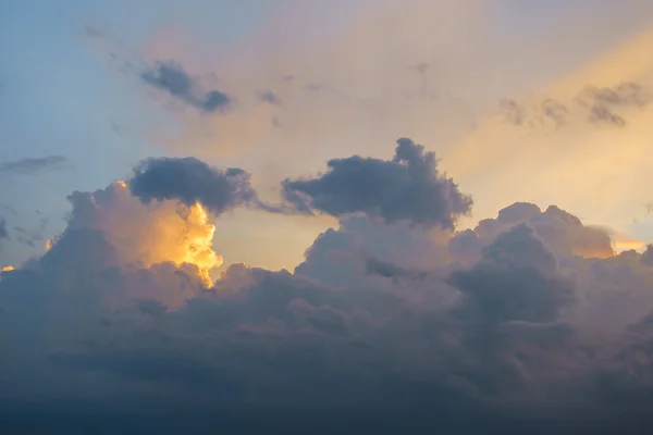 Sunset with sun rays and big cloud background — Stock Photo, Image