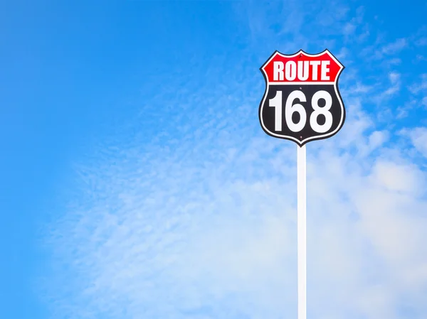 Vintage route 168 road  sign and blue sky — Stock Photo, Image