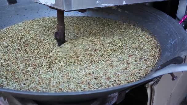 Sunflower Seeds cooked Rotating by machine, close up — Stock Video
