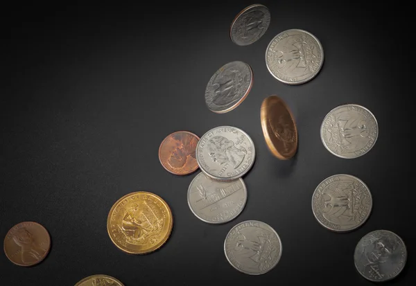 American coin falling on black background — Stock Photo, Image