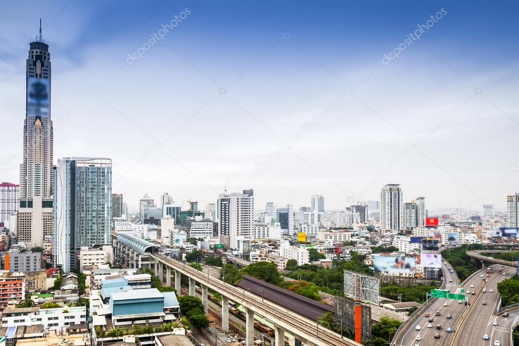 Business Building Bangkok city area at night life with transport