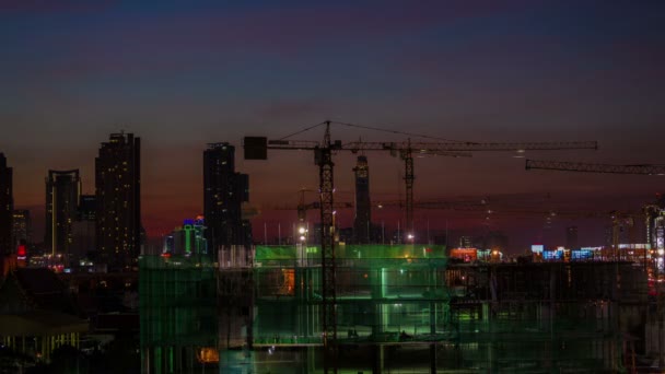 Timelapse, Group of worker are building construction or mall, teamwork concept taken at twilight scene as day to night, wide-angle view — стоковое видео