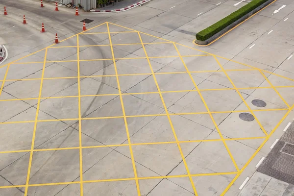 Crossing with road marking white arrows and rectangles on asphal — Stock Photo, Image