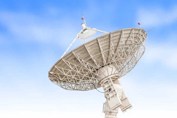 Satellite dish antenna radar big size isolated on blue sky backg — 스톡 사진