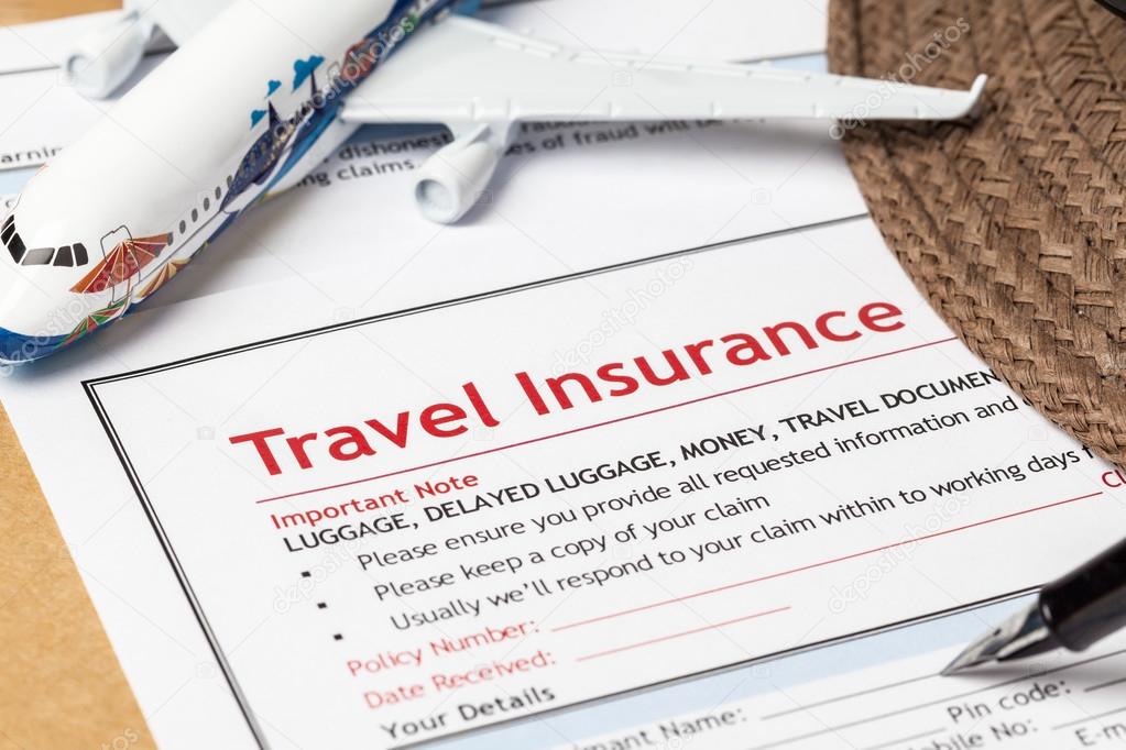 Travel Insurance Claim application form and hat with eyeglass an