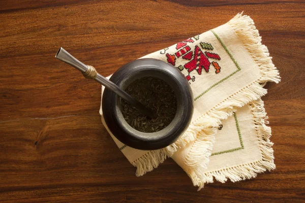 Yerba mate gourd on wooden table — Stock Photo, Image