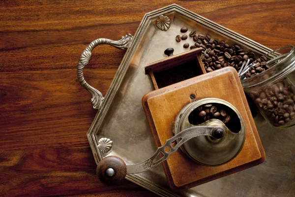 Grinder and coffee beans — Stock Photo, Image