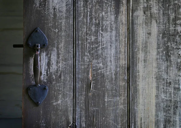 Old wooden door with handle — Stock Photo, Image