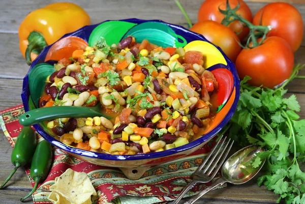 Mexican chili con carne with ingredients — Stock Photo, Image