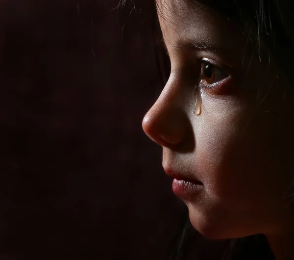 A girl cry in dark Stock Picture