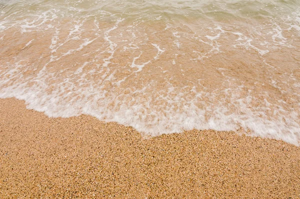 Våg av havet på stranden — Stockfoto