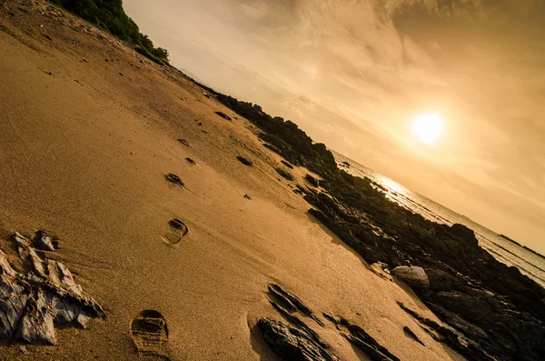 Footprints and sea in the morning — Stock Photo, Image