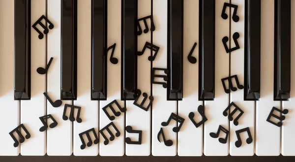 Primer Plano Las Notas Negras Madera Teclado Piano —  Fotos de Stock