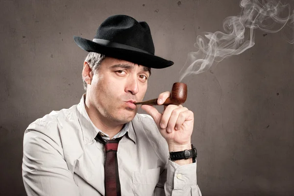 Middle aged man with a pipe — Stock Photo, Image