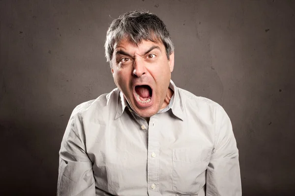 Man with angry expression — Stock Photo, Image