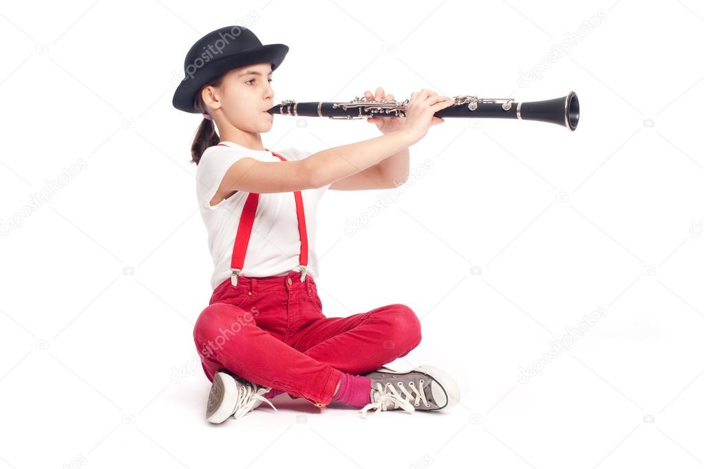 little girl playing clarinet