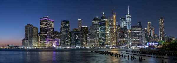 New York, USA downtown skyline at dusk on the East River