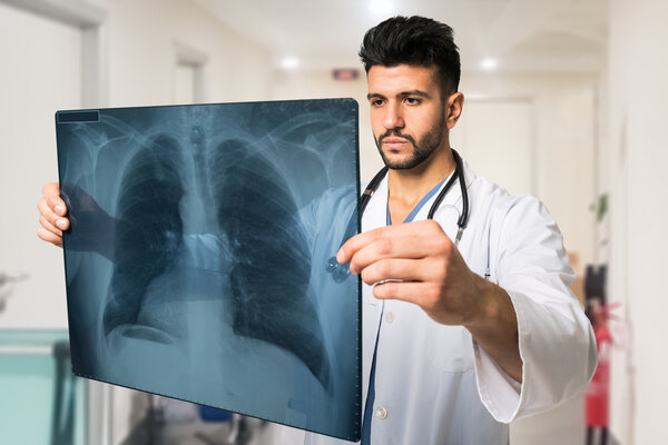 Doctor examining radiography