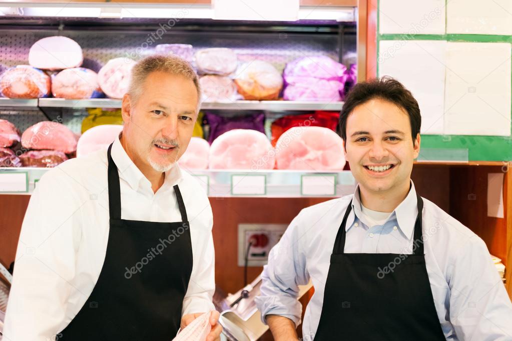 shopkeepers in their grocery store