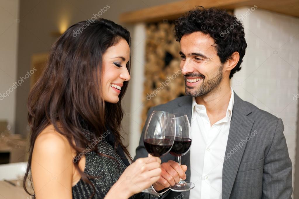 Couple toasting wine glasses — Stock Photo © minervastock #102733564