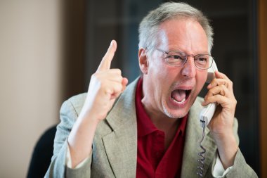 angry businessman yelling at phone clipart