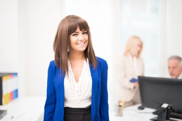 Businesswoman in bright office — Stock Photo, Image