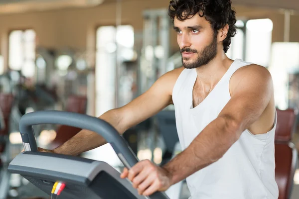 Man working out on treadmill — Stock Photo, Image