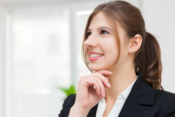 Woman in a thoughtful expression — Stock Photo, Image