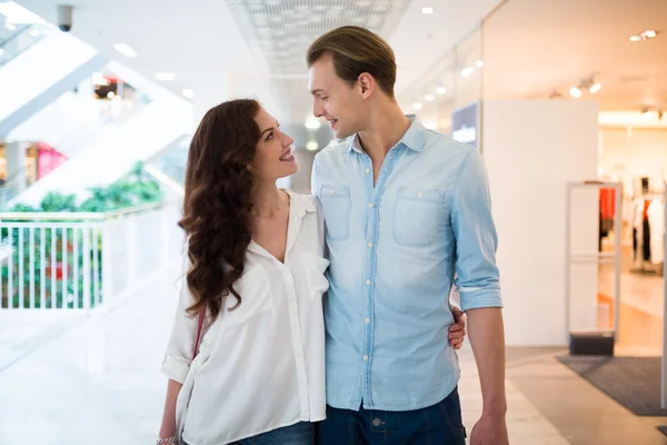 Couple walking in a shopping mall — Stock Photo, Image