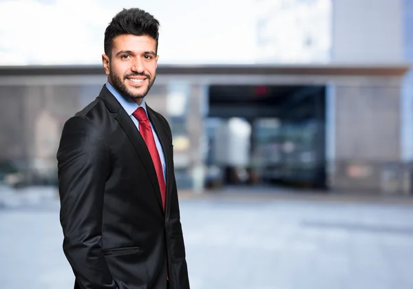 Young manager walking in city — Stock Photo, Image