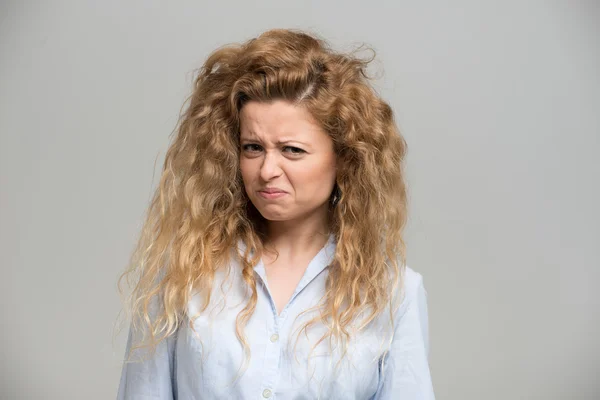 Woman making disgusted expression — Stock Photo, Image