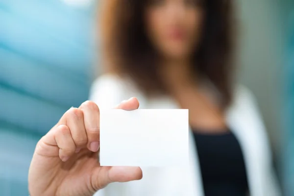 Businesswoman showing business card — Stock Photo, Image