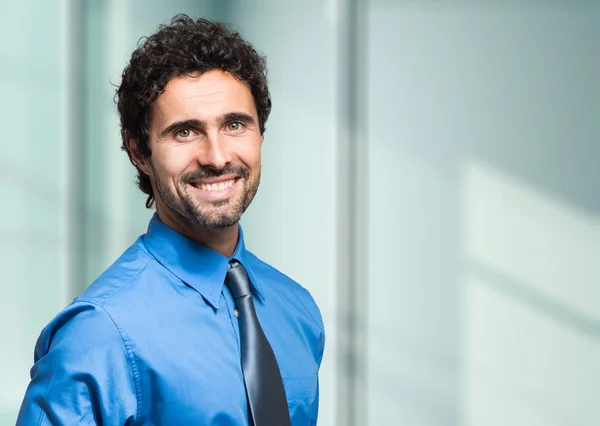 Handsome manager looking at camera — Stock Photo, Image