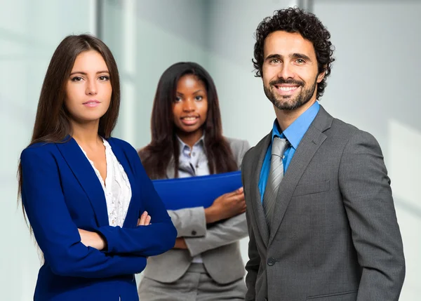 Business people looking at camera — Stock Photo, Image