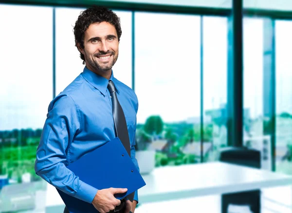 Handsome manager with clipboard — Stock Photo, Image