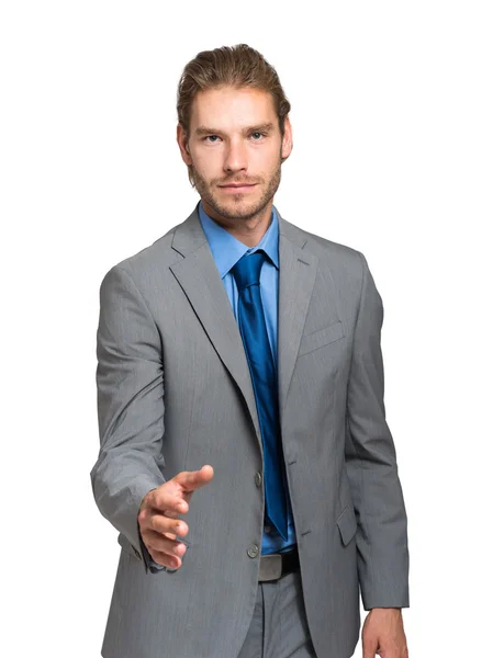 Businessman giving a handshake — Stock Photo, Image