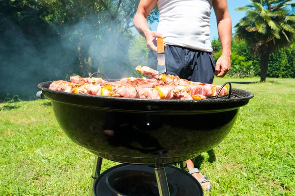 Meat on a barbeque grill — Stock Photo, Image