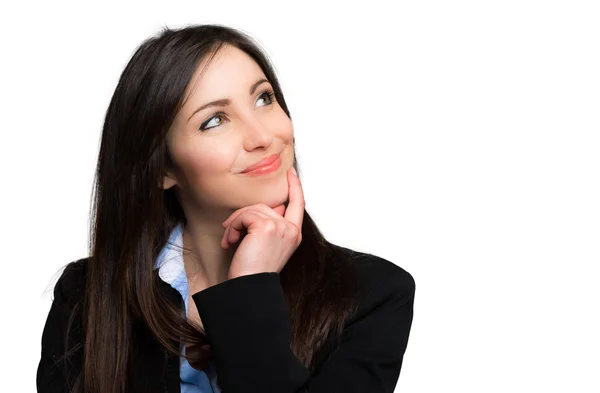 Woman with hand on chin while thinking — Stock Photo, Image