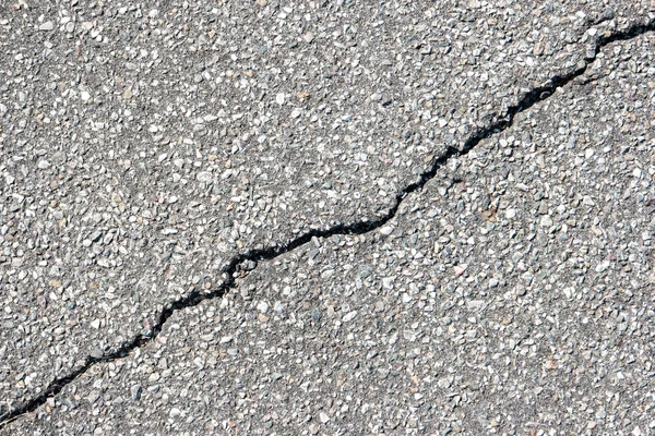 Cracked road asphalt detail — Stock Photo, Image