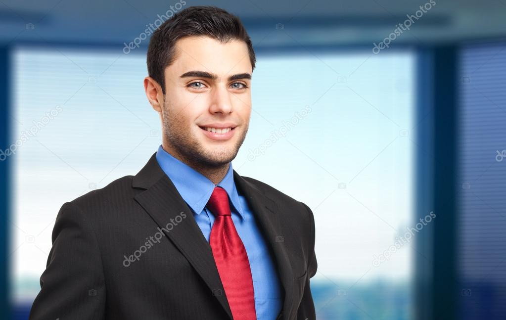 handsome businessman in his office