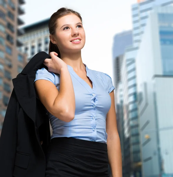 Manager holding her jacket — Stock Photo, Image