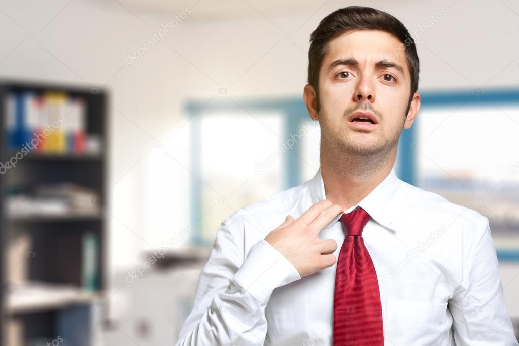 Fired businessman sweating