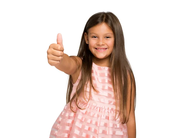 Gülümseyen kız ok işareti yapmak — Stok fotoğraf