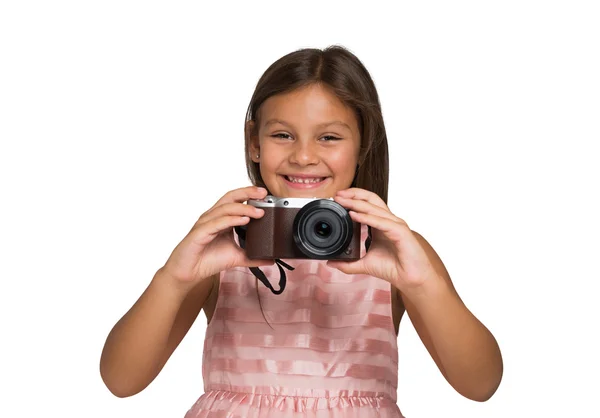 Niño sosteniendo una cámara compacta — Foto de Stock
