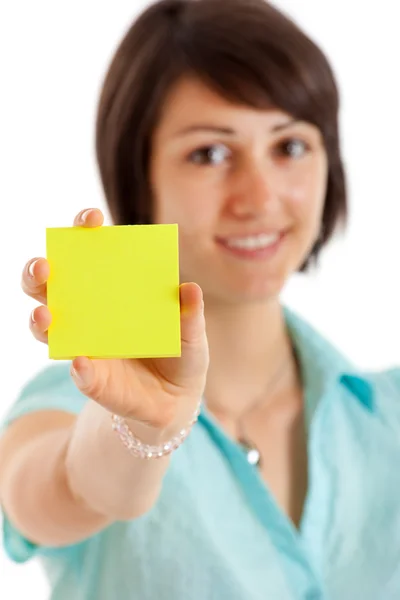 Businesswoman showing a sticky note — Stock Photo, Image