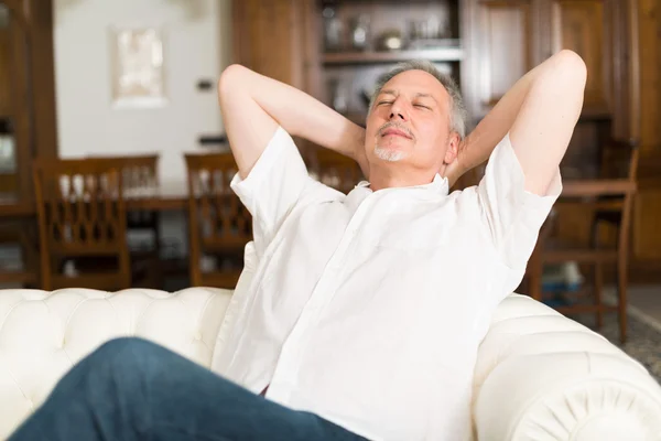 Man relaxing in his apartment — Stock Photo, Image
