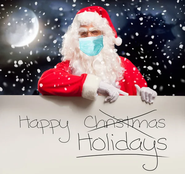Άγιος Βασίλης Μάσκα Προσώπου Που Δείχνει Μια Πινακίδα Χαρούμενες Γιορτές — Φωτογραφία Αρχείου